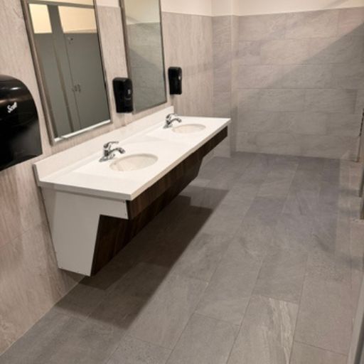 tile floors in a commercial hallway