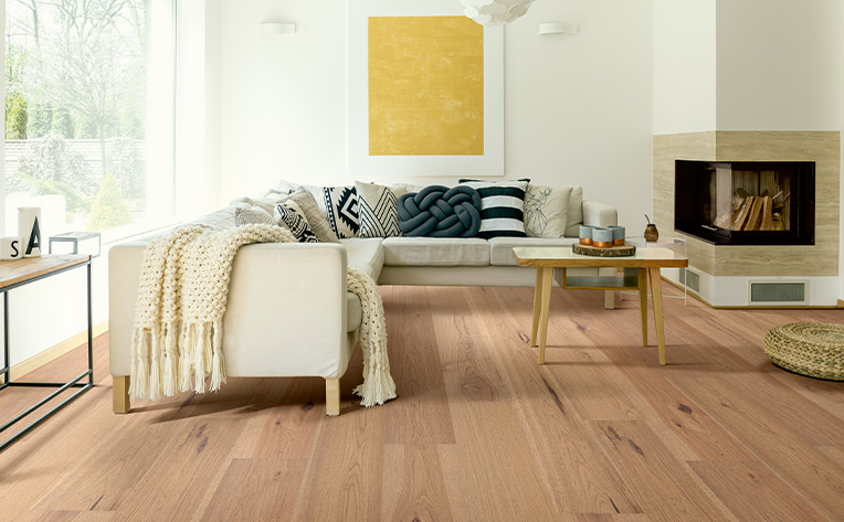 hardwood living room image with white couch